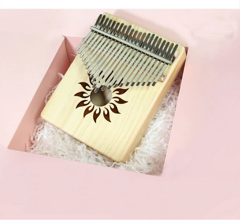 Engraved 21 Key Pine Wood Kalimba Instrument thumb piano with passionate sun design – Relaxation Studio